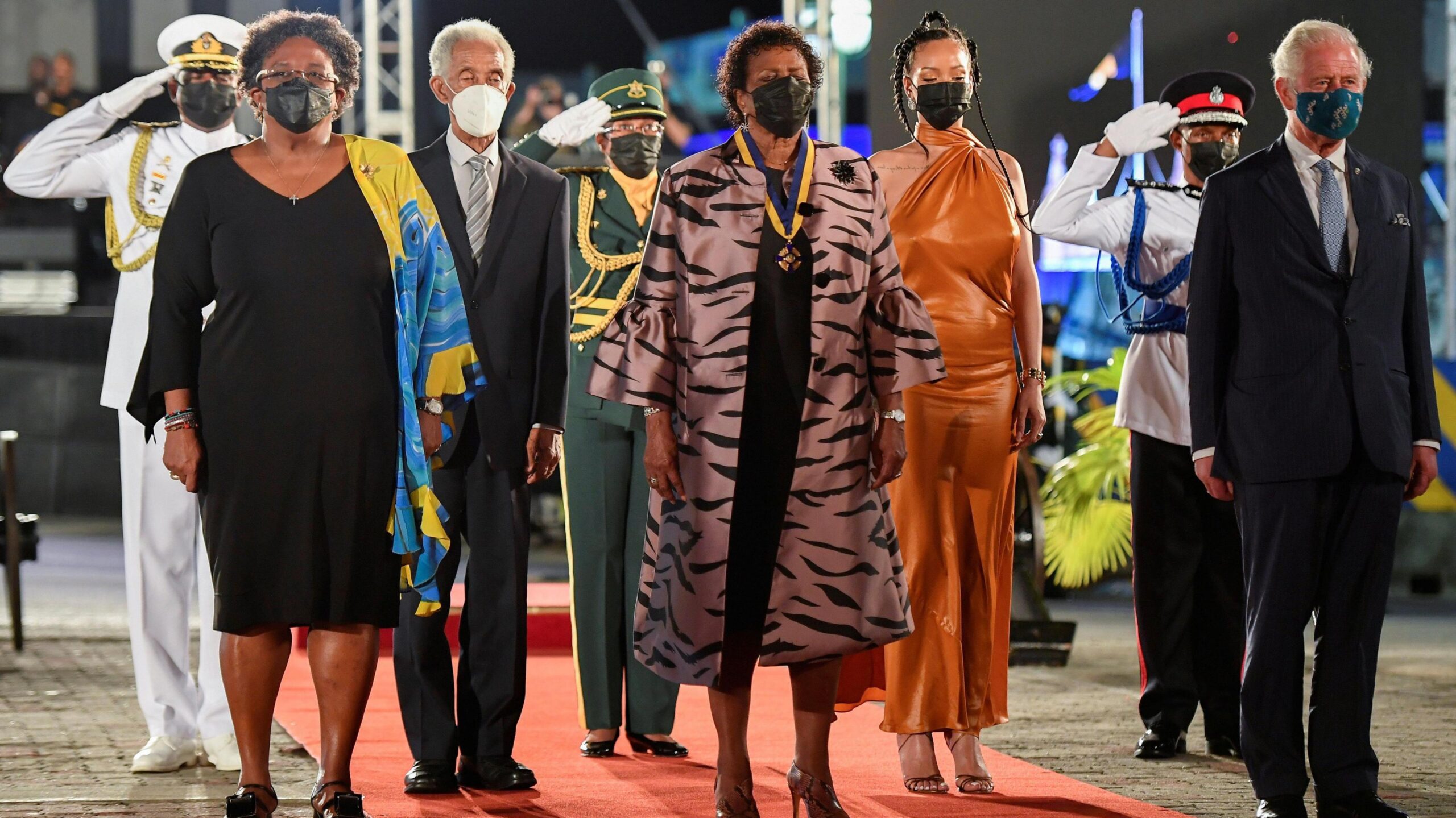 Sir Garfield Sobers (third left, white mask) attends the presidential inauguration ceremony as Barbados formally becomes a republic, flanked by prime minister Mia Mottley, president Dame Sandra Mason, singer Rihanna and Prince Charles