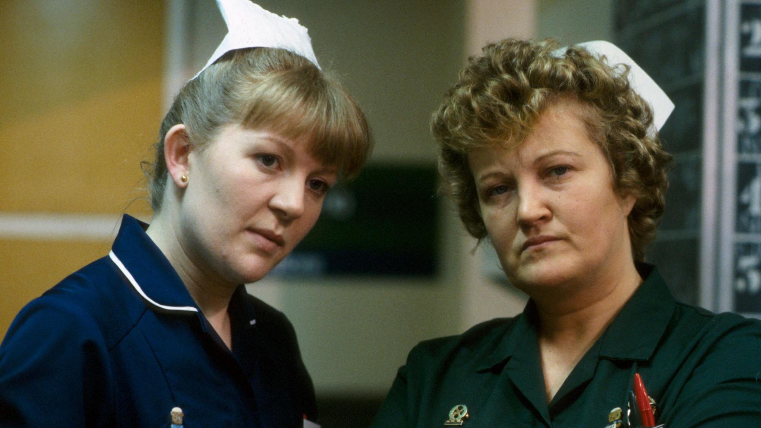 Cathy Shipton and Brenda Fricker in nurses' uniforms in a scene from Casualty