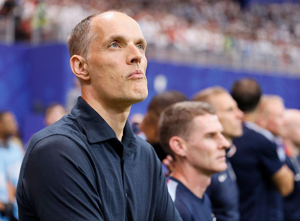 A close-up picture of England head coach Thomas Tuchel looking thoughtful on the touchline in the World Cup semi-final against Argentina.