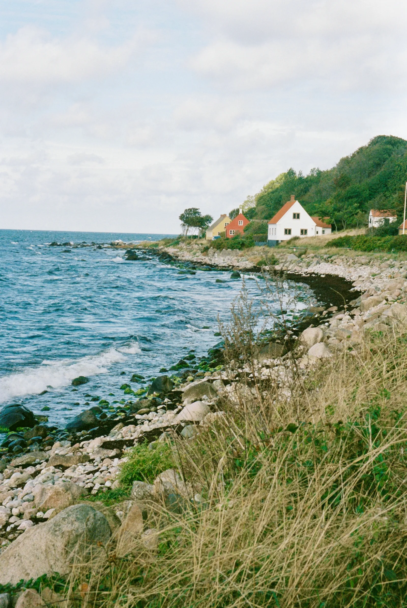 Image may contain Nature Outdoors Scenery Architecture Building Shelter Sea Water Landscape Rock Beach and Coast