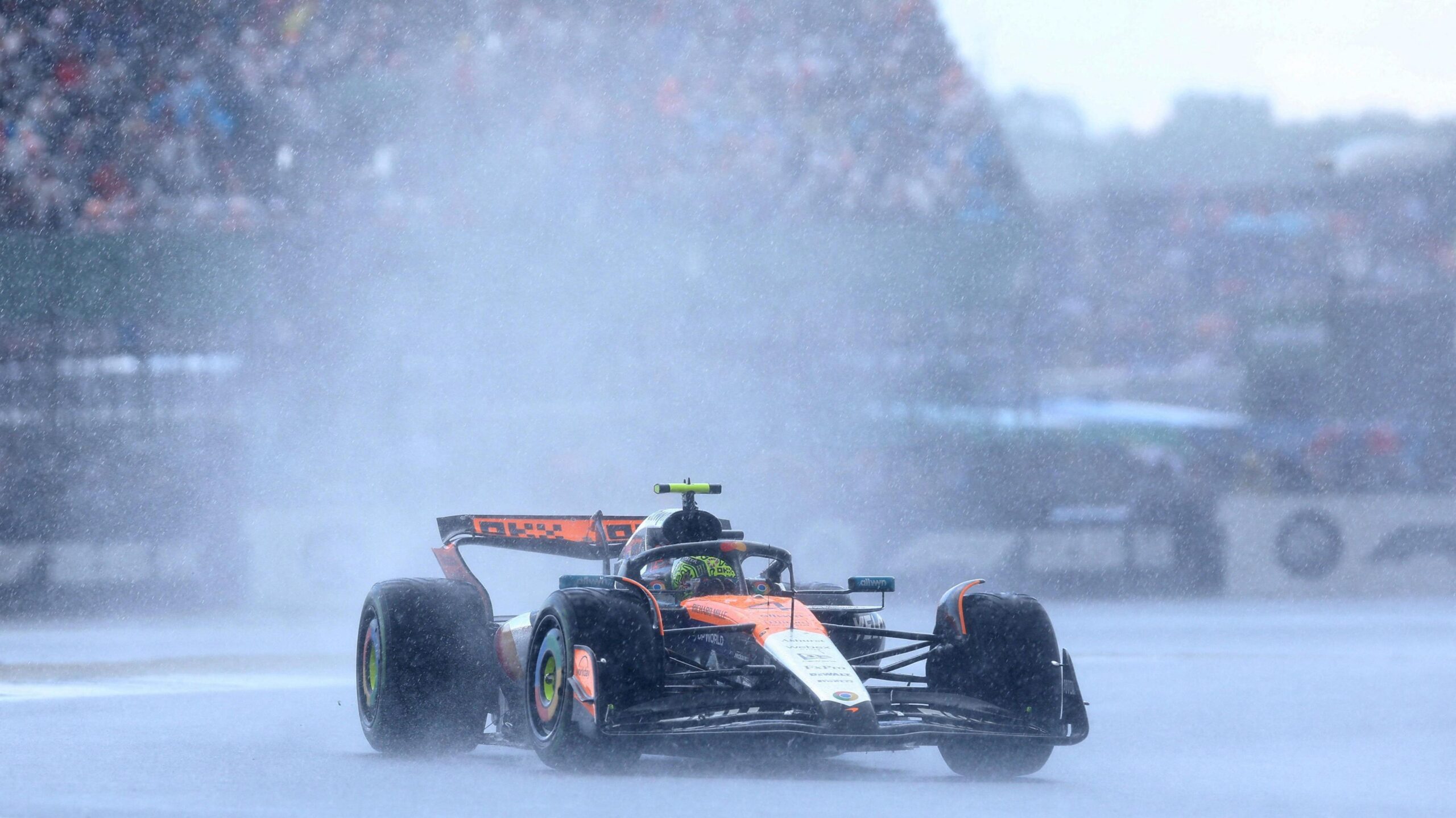 Lando Norris' McLaren during the British Grand Prix as torrential rain falls