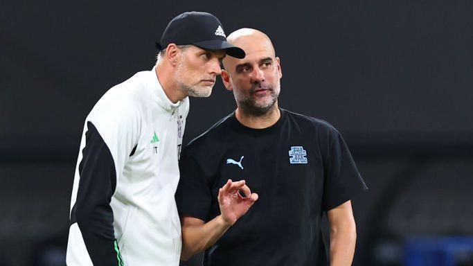 Thomas Tuchel and Pep Guardiola talking