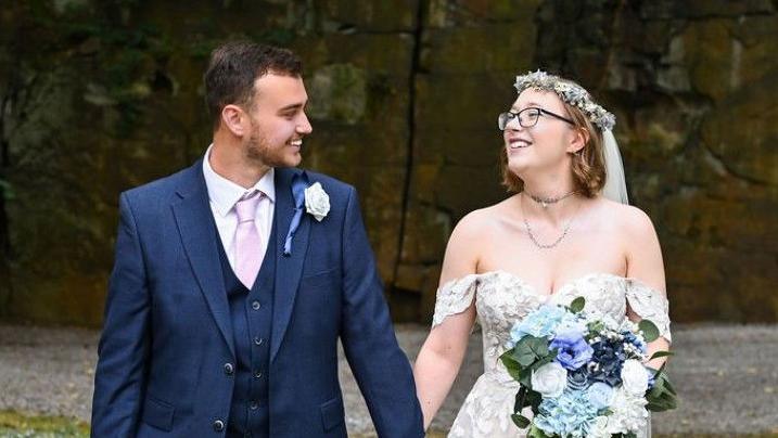 Georgia Finch and her husband on their wedding day