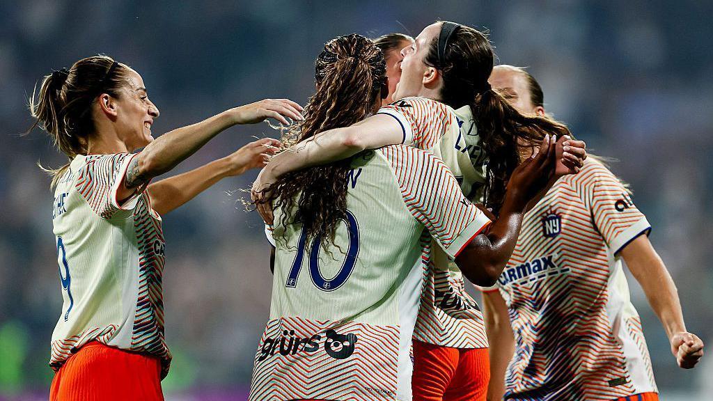 Rose Lavelle celebrates with her team-mates
