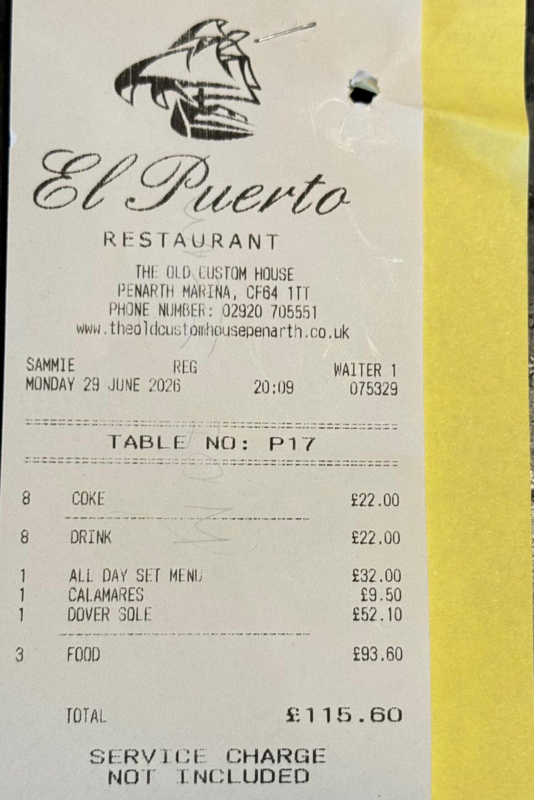 A black and white receipt with restaurant name "El Puerto" on the top and the restaurant's Penarth marina address. It is dated Monday 29 June at 20:19. The items are listed as followed: 8 Coke, £22, All day set menu £32, Calamares £9.50, Dover Sole, £52.10. Total = £115.60.