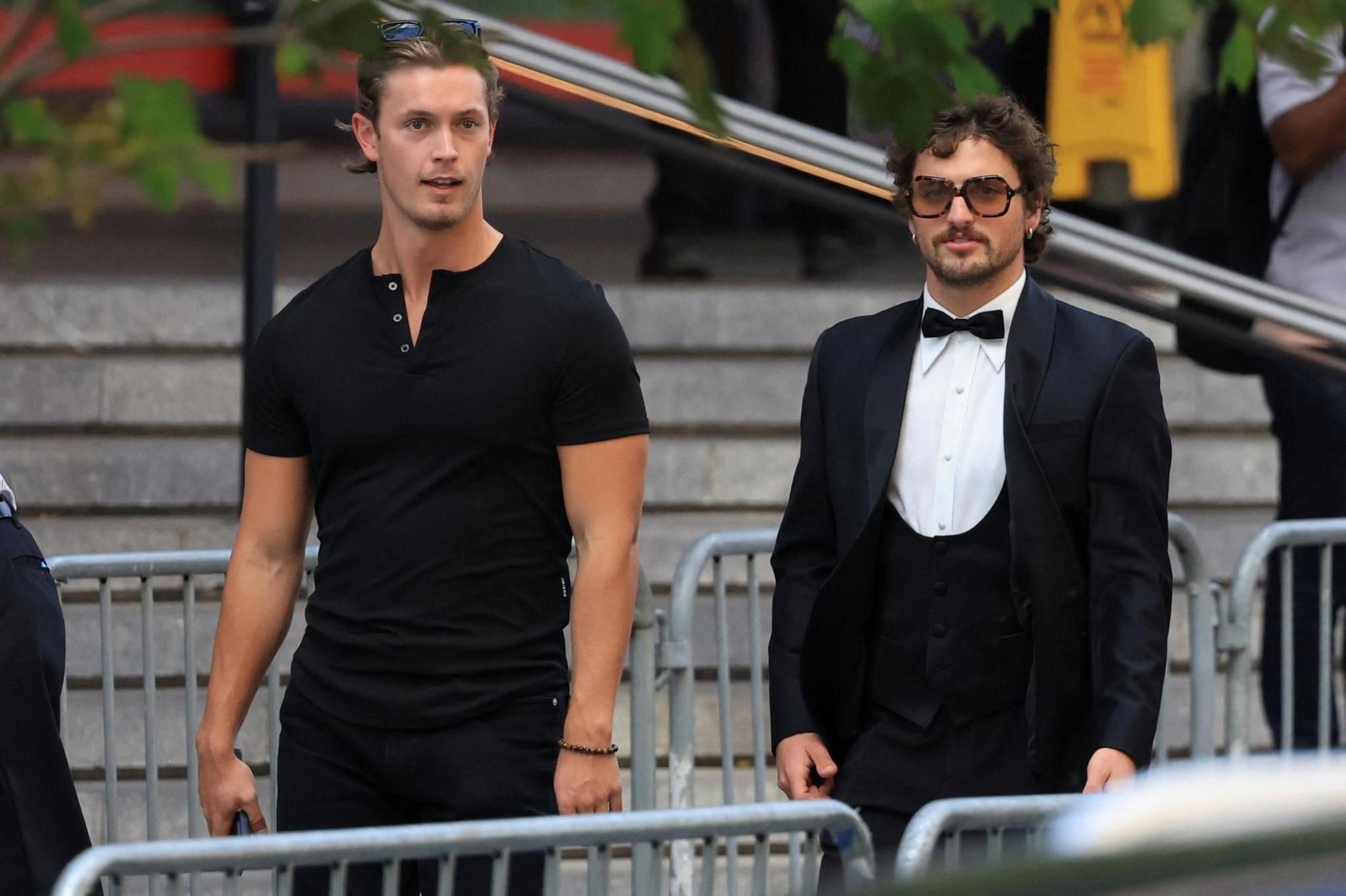 US singer Benson Boone, right, arrives at Madison Square Garden