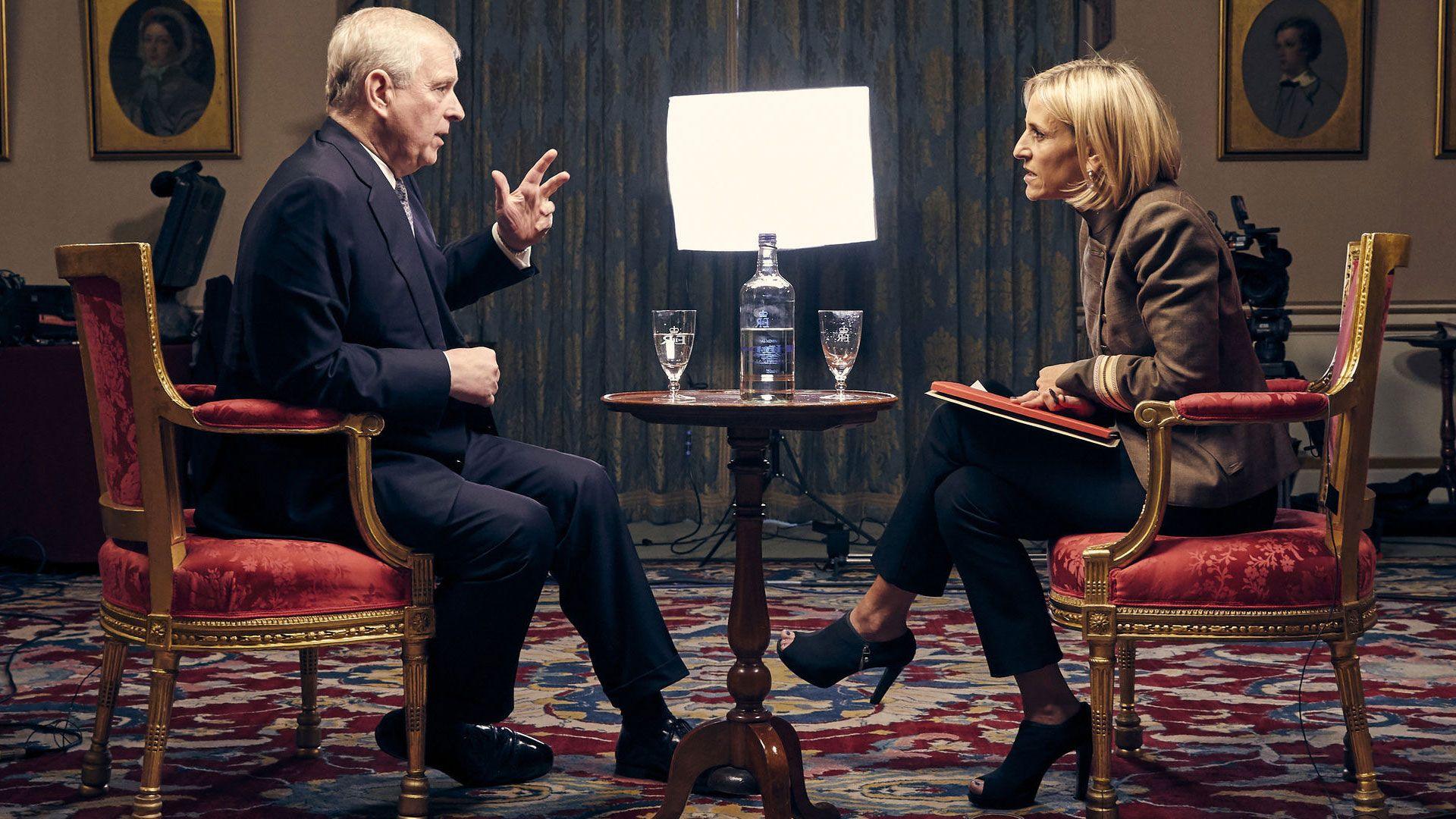 Andrew Mountbatten-Windsor sits in a suit, being interview by Emily Maitlis