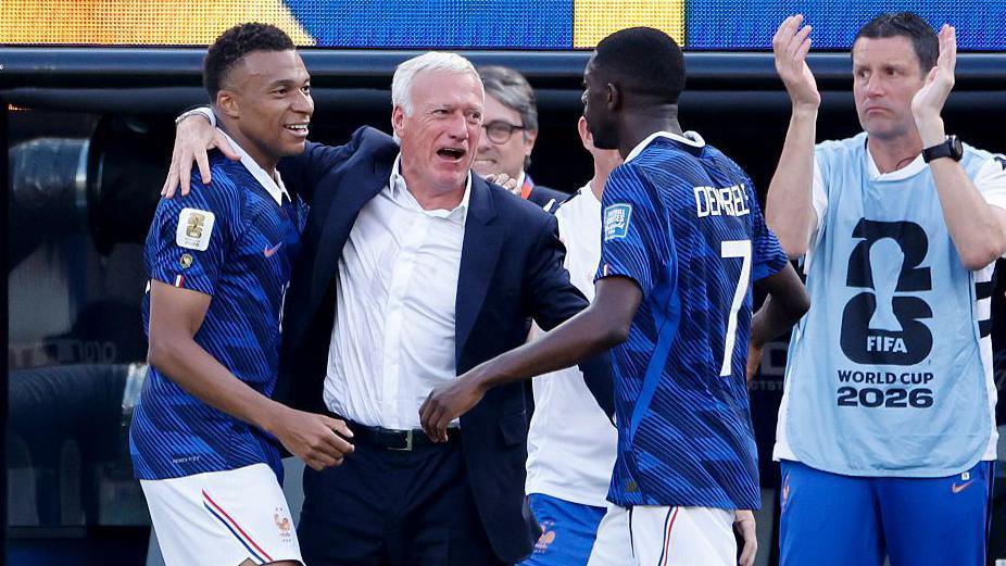 Kylian Mbappe, Didier Deschamps and Ousmane Dembele