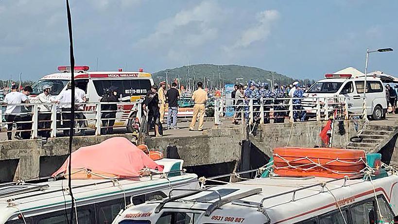 Ambulances line up on a pier to help victims after a tourist vessel capsized off Phu Quoc island in southern Vietnam. Photo: 11 July 2026
