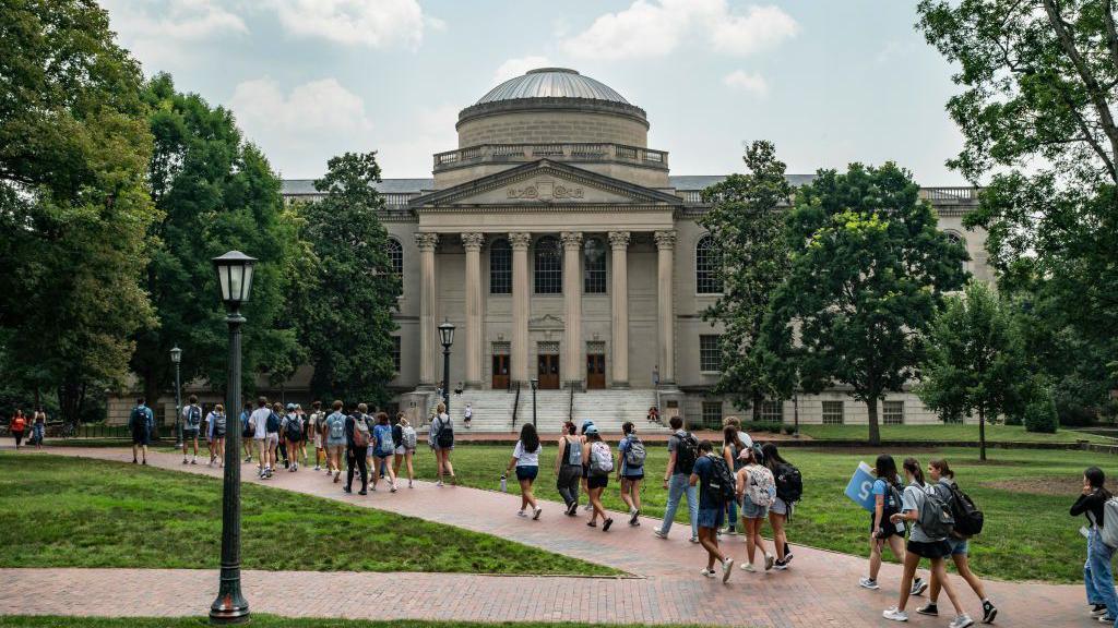 People walk on the campus of the University of North Carolina Chapel Hill on June 29, 2023 in Chapel Hill, North Carolina