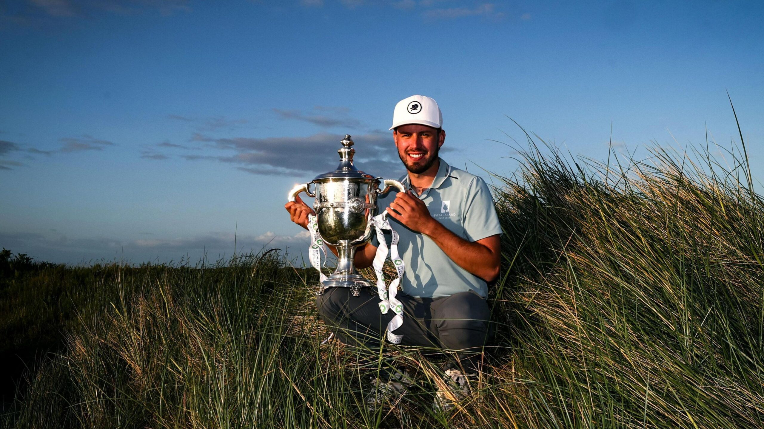 David Howard poses with the 2025 East of Ireland trophy