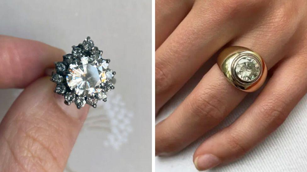 Two rings, one a more traditional large diamond set with smaller ones around it, the second a single diamond set in a thicker gold band