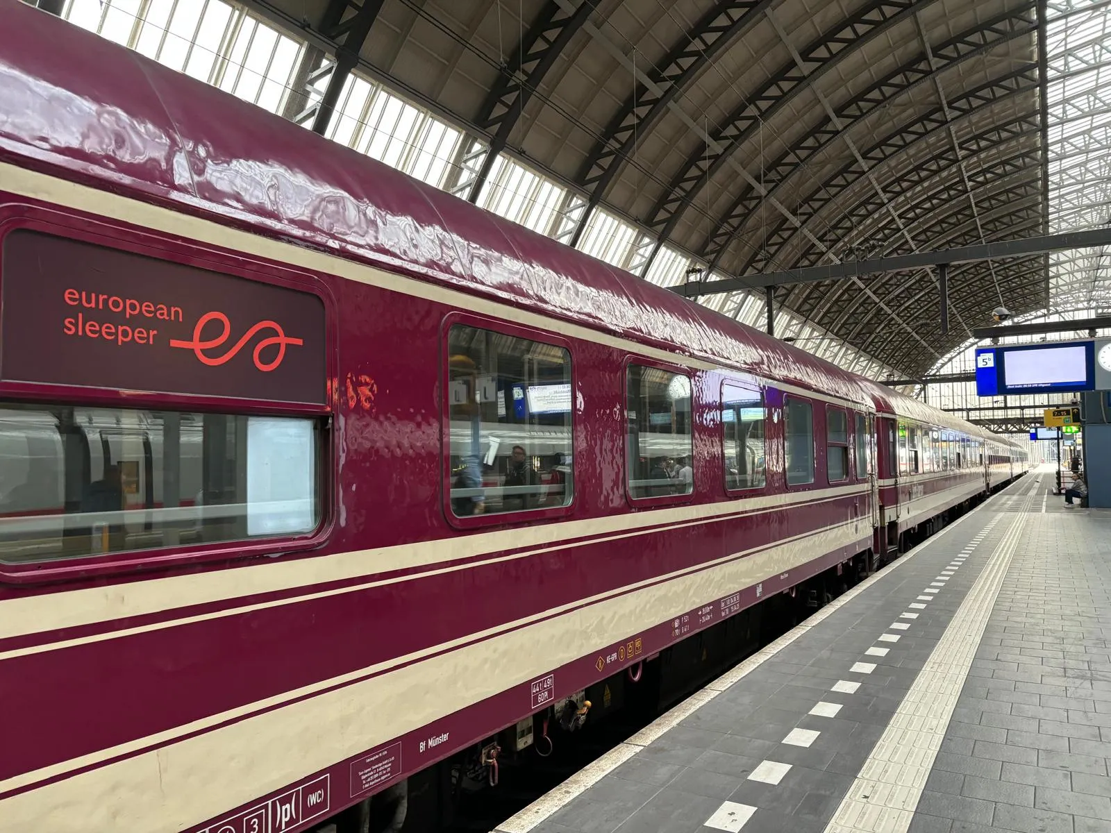 Image may contain Terminal Railway Train Train Station Transportation Vehicle and Person