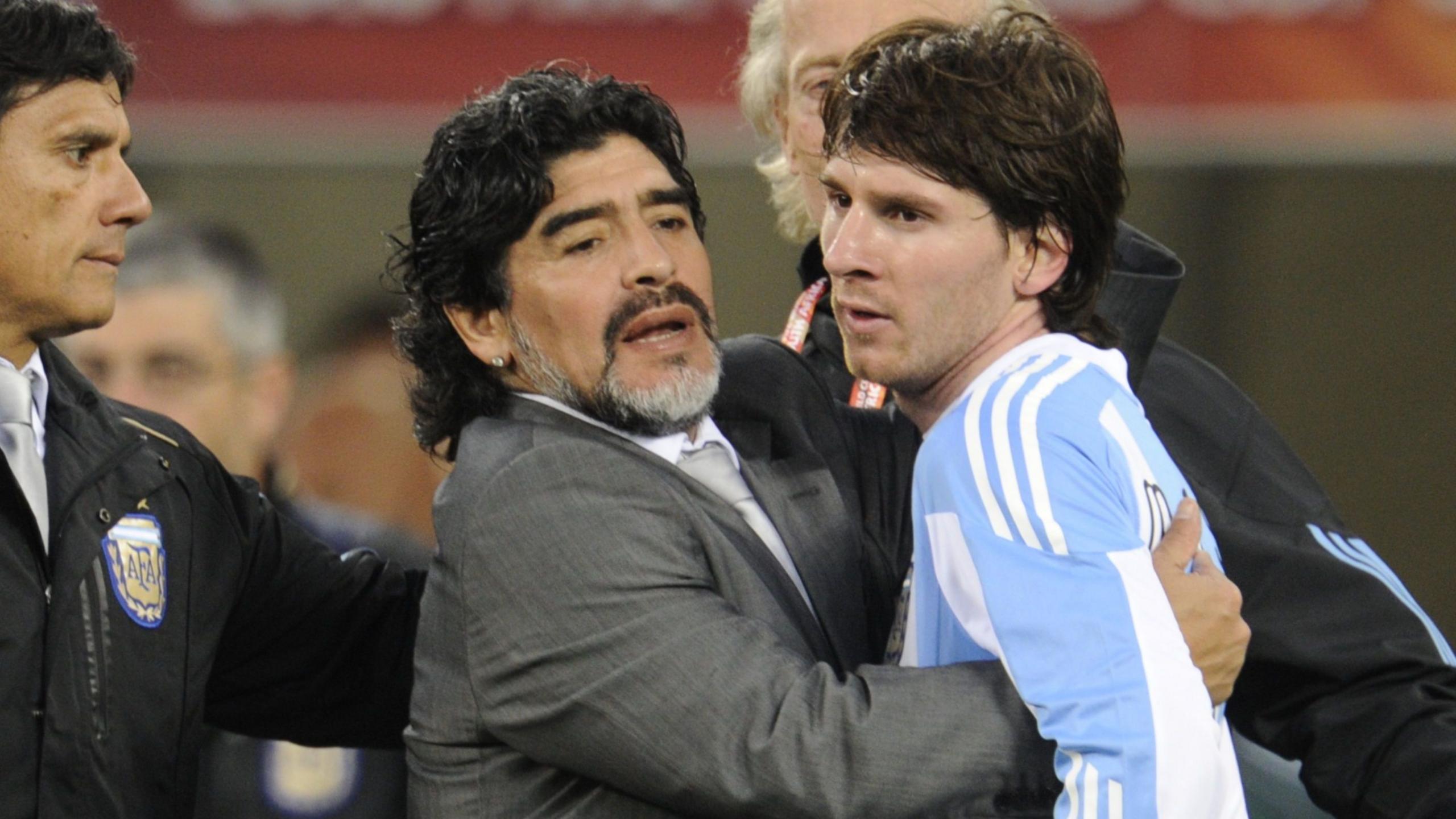 Diego Maradona and Lionel Messi embrace