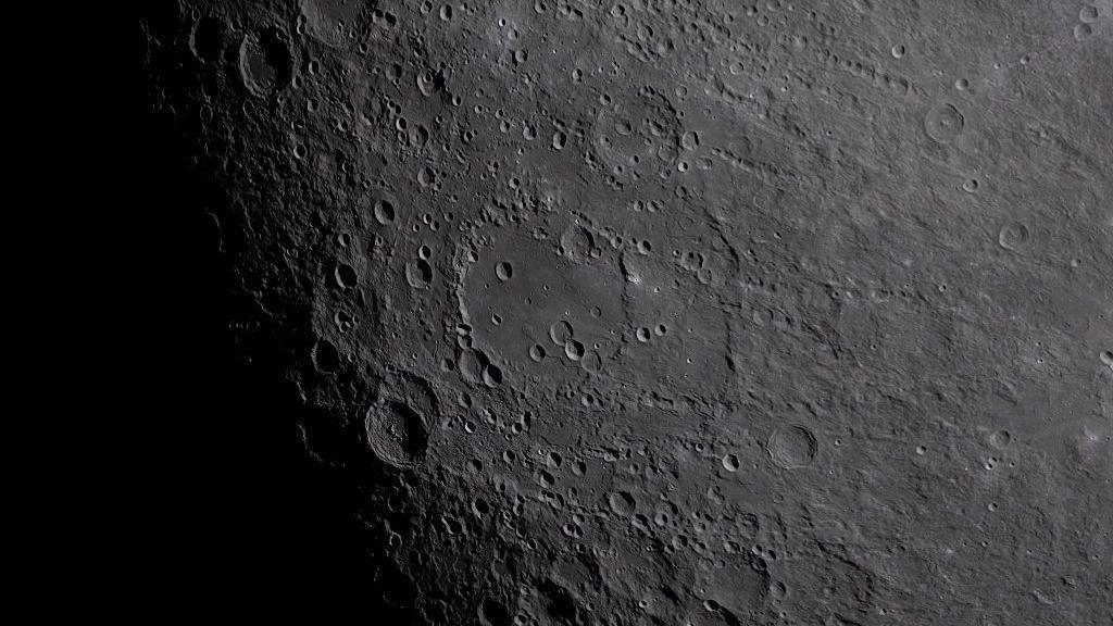 A Nasa handout image of the Moon's surface shows the Hertzsprung with its distinctive two concentric rings of mountains, revealing an ancient impact structure