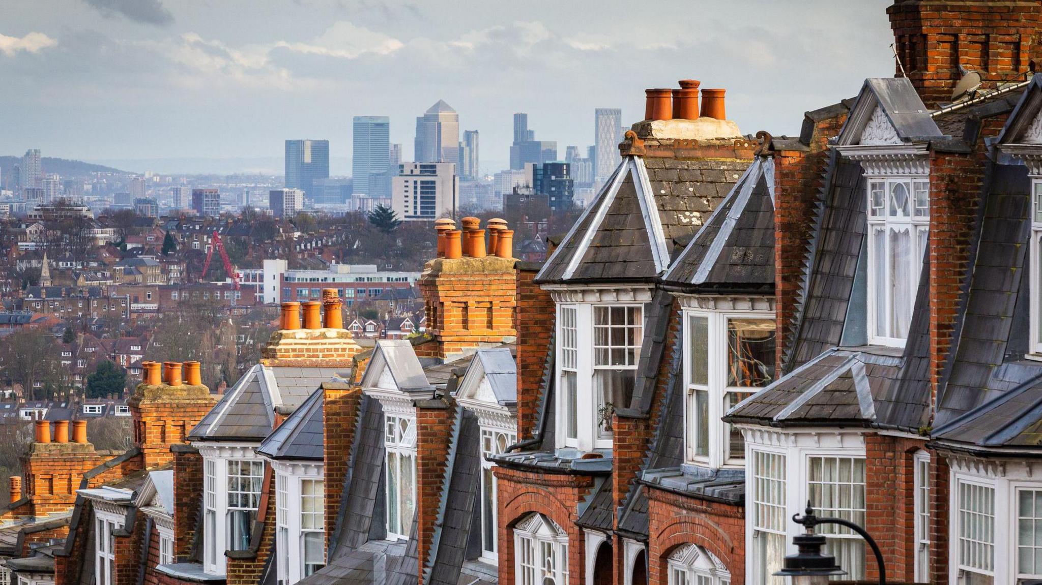 View of houses with London skyline in the distance
