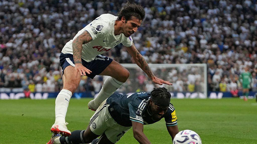 Tottenham's Sandro Tonali challenges Newcastle's Anthony Elanga during their Premier League match at the Tottenham Hotspur Stadium in north London.