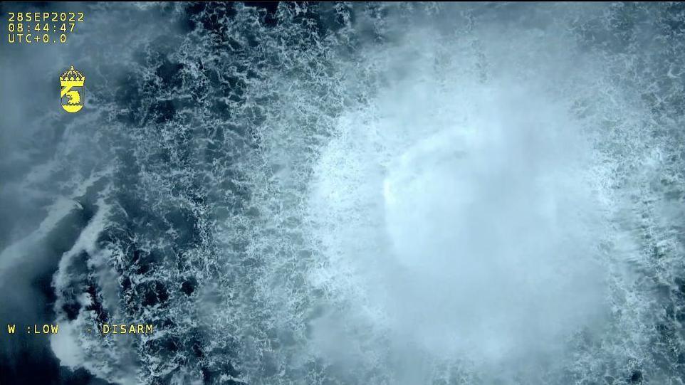 A screen grab from Danish Defense shows a gas leak causes bubbles on the surface of the water at Sea in Sweden on September 30, 2022