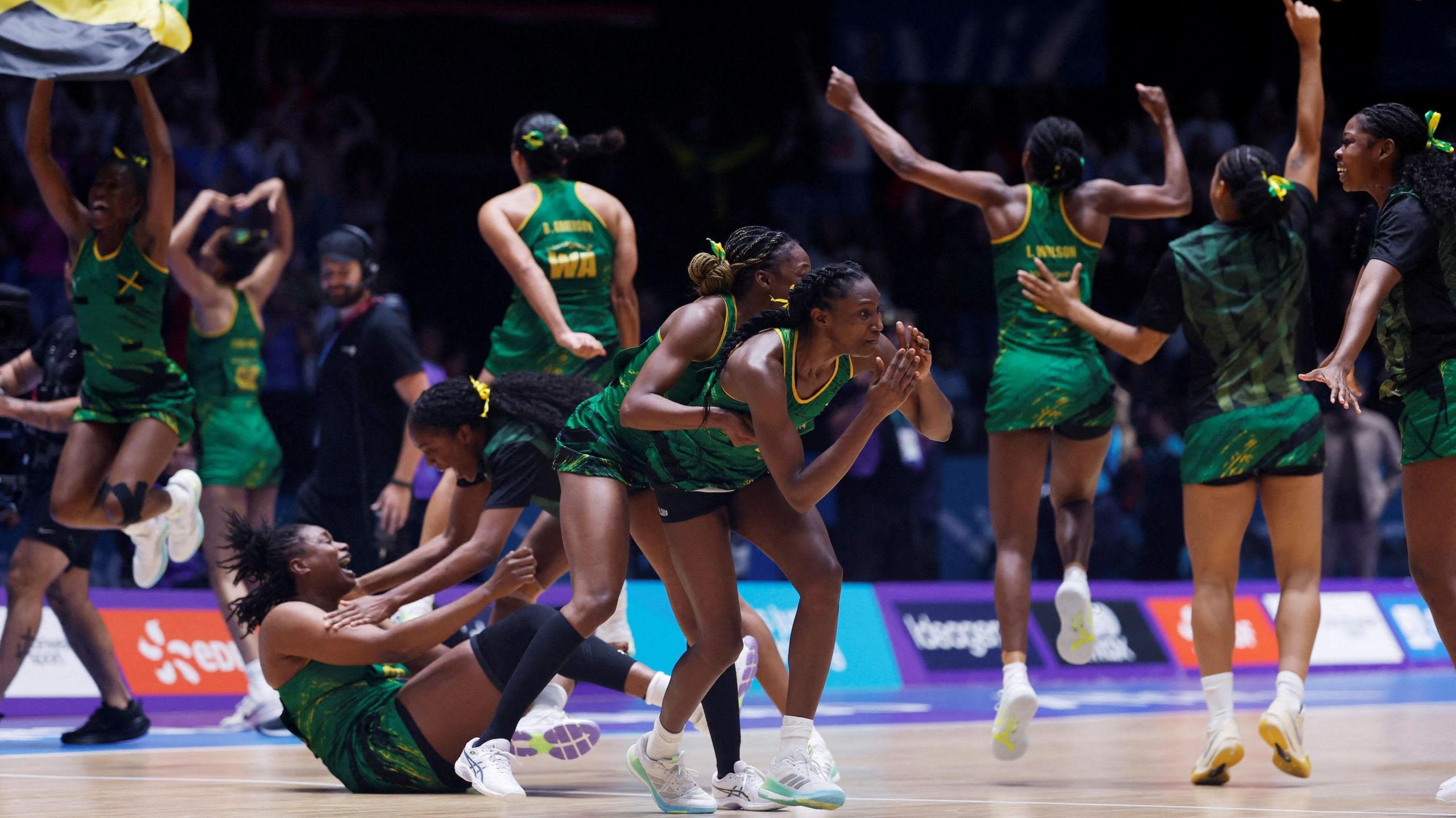 Jamaica's players celebrate victory over Australia
