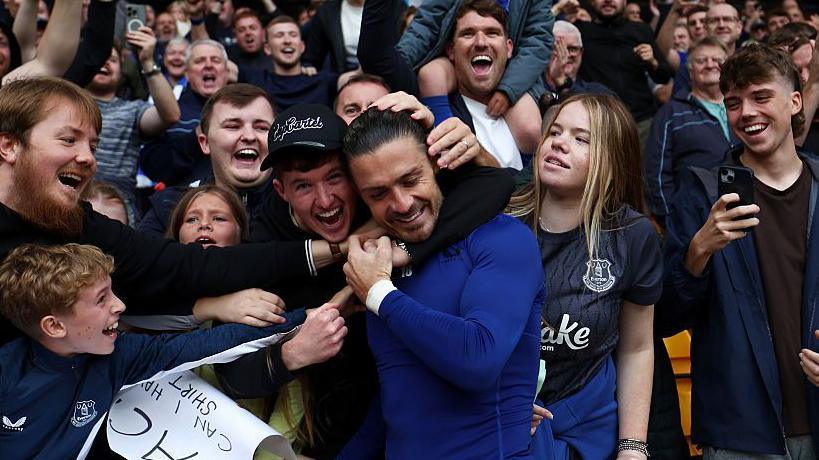 Jack Grealish with excited Everton fans