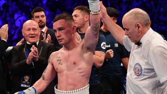 Paddy Maguire, on official duty with the British Boxing Board of Control, claps his hands as Carl Frampton had his hand raised in victory