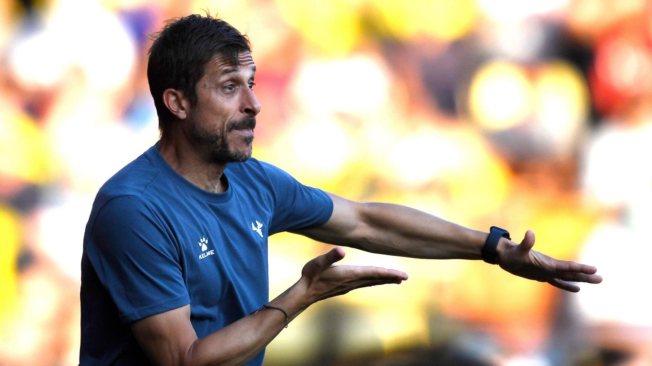 Alessio Dionisi gestures from the sideline during Watford's friendly with Fiorentina