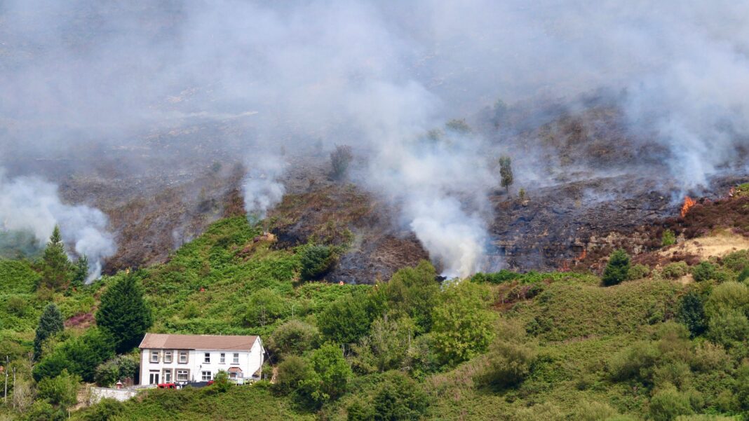 Fires started ‘deliberately’ on mountain as crews tackle blaze Fires started ‘deliberately’ on mountain as crews tackle blaze