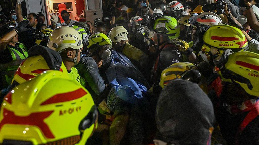 Woman pulled alive from rubble 36 hours after Colombia quake Woman pulled alive from rubble 36 hours after Colombia quake