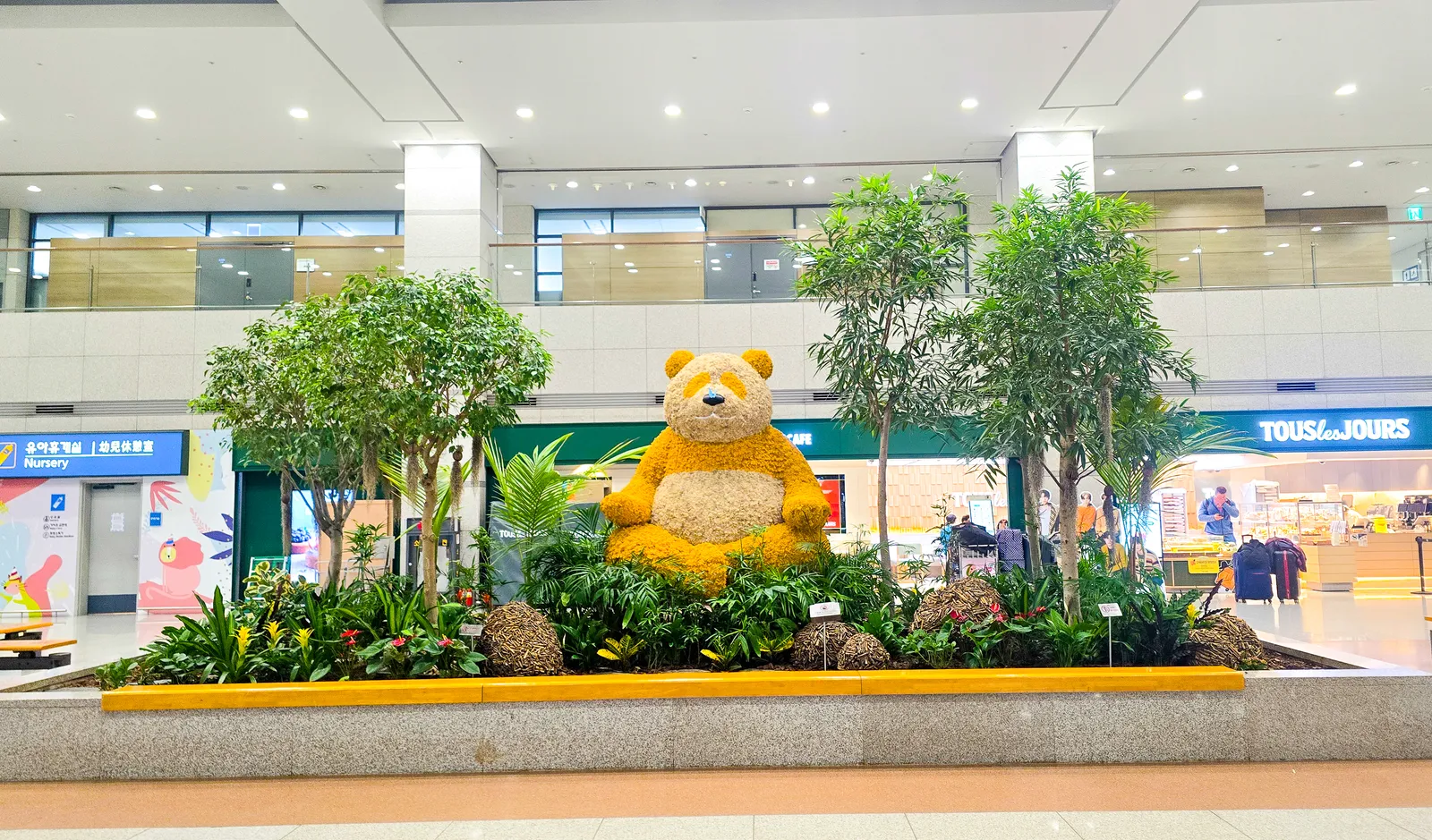 Image may contain Indoors Teddy Bear Toy Person Architecture Building and Foyer