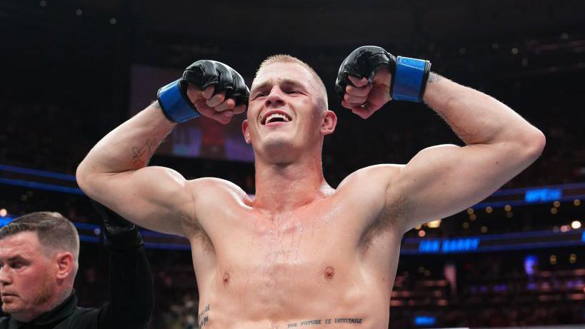 Ian Machado Garry celebrates beating Neil Magny in 2023