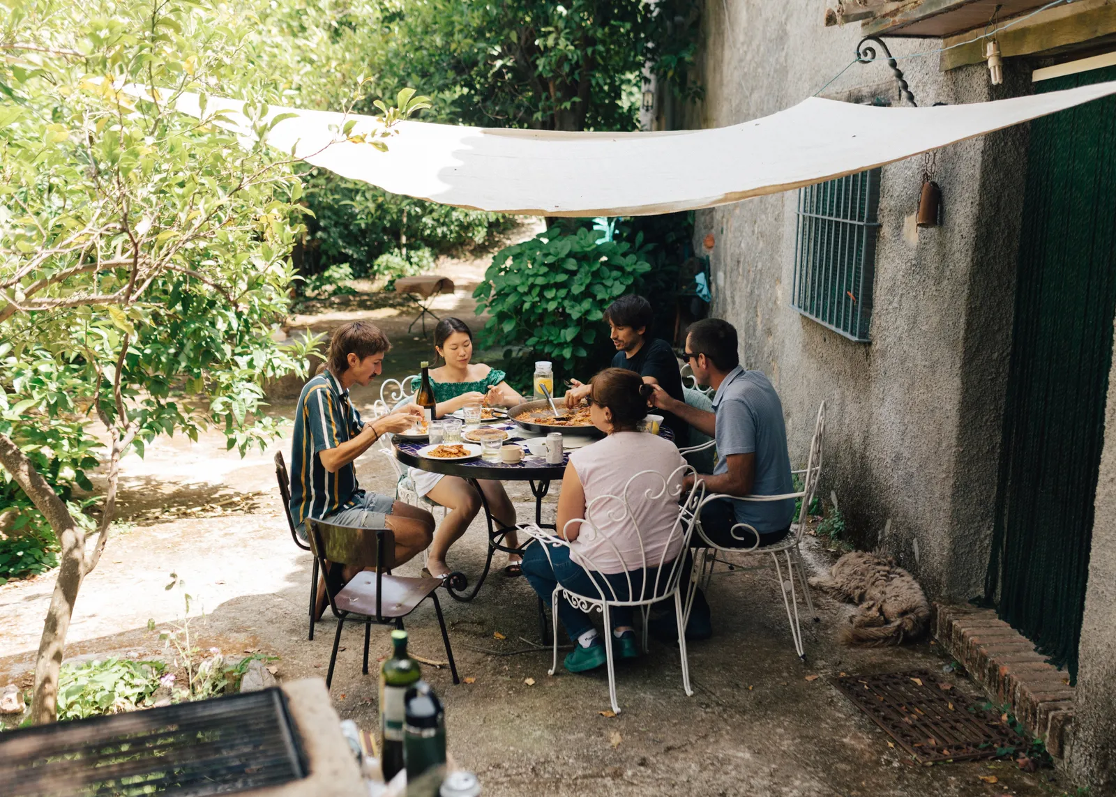 Image may contain Lenny Von Dohlen Alex Wyndham Dining Table Furniture Table Adult Person Teen Outdoors and Indoors