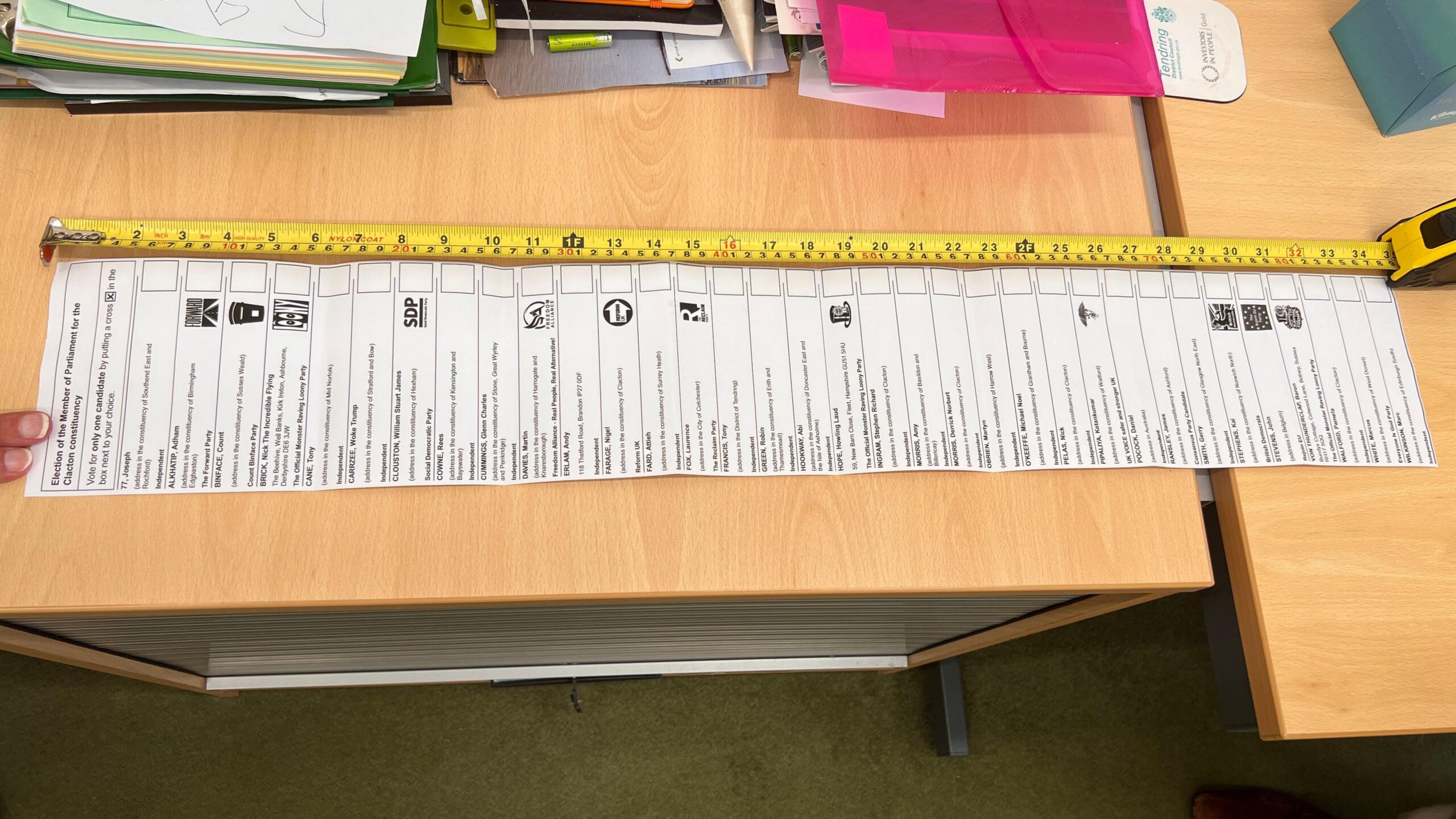 Clacton by-election ballot paper shown on a table next to an extended tape measure for scale