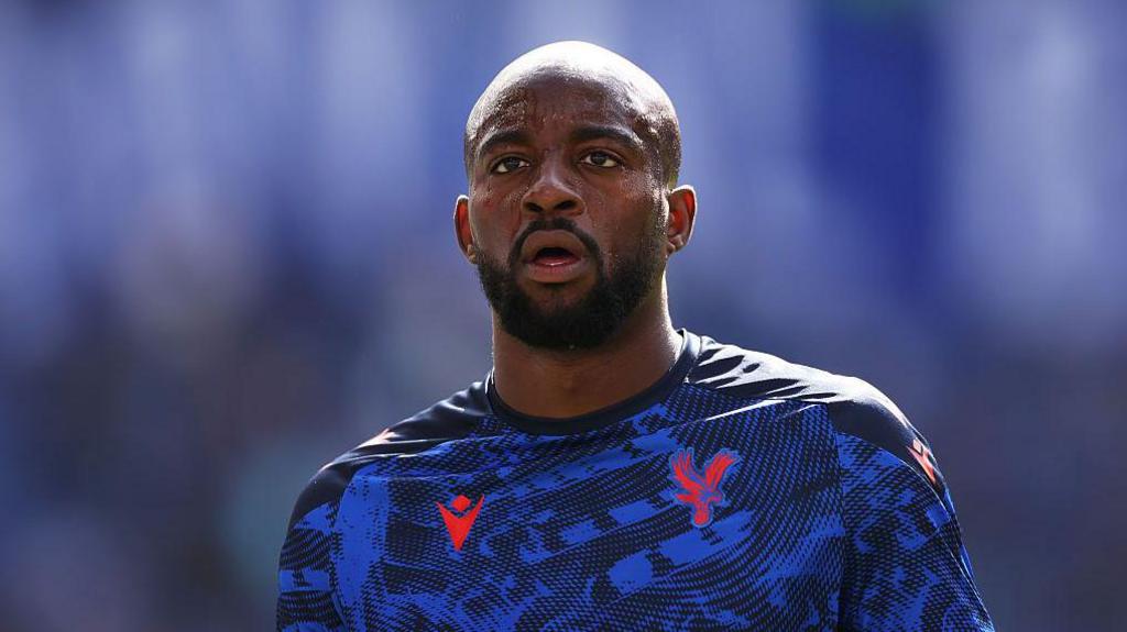 Jean-Philippe Mateta warming up for Crystal Palace