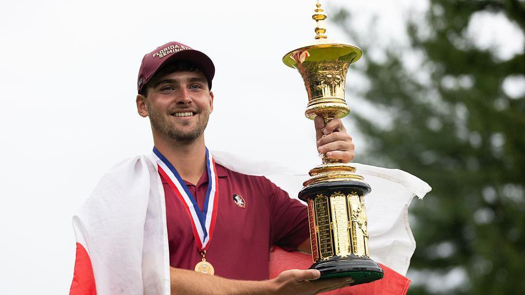 Jack Whaley is all smiles with the Havemeyer Trophy