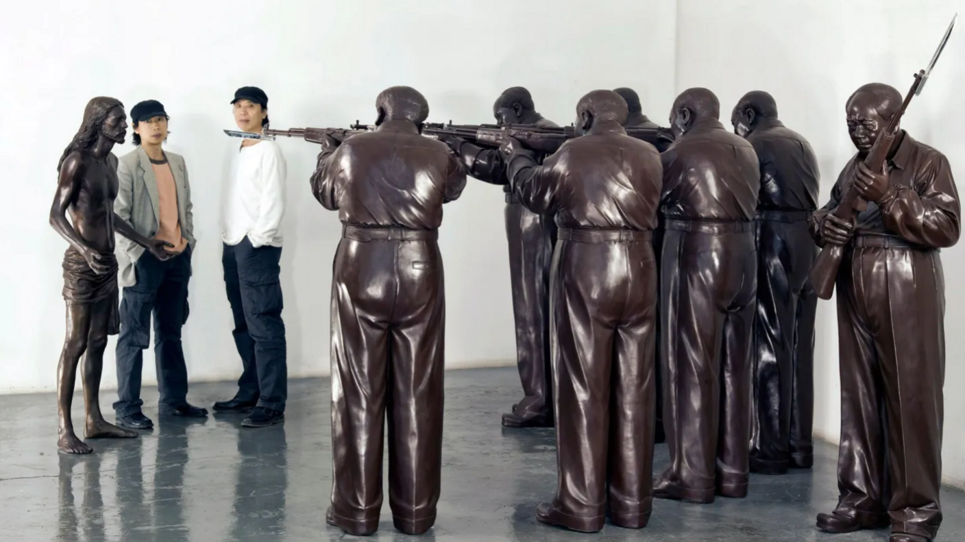 "Execution of Christ" depicts a sculpture comprising a squad of Mao-like figures holding Jesus Christ at gunpoint