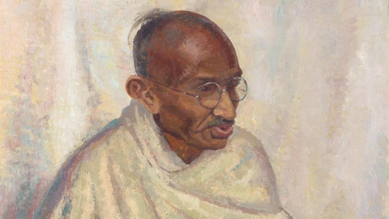 An oil painting of Mahatma Gandhi where he has a white cloth draped around his torso and is wearing round glasses