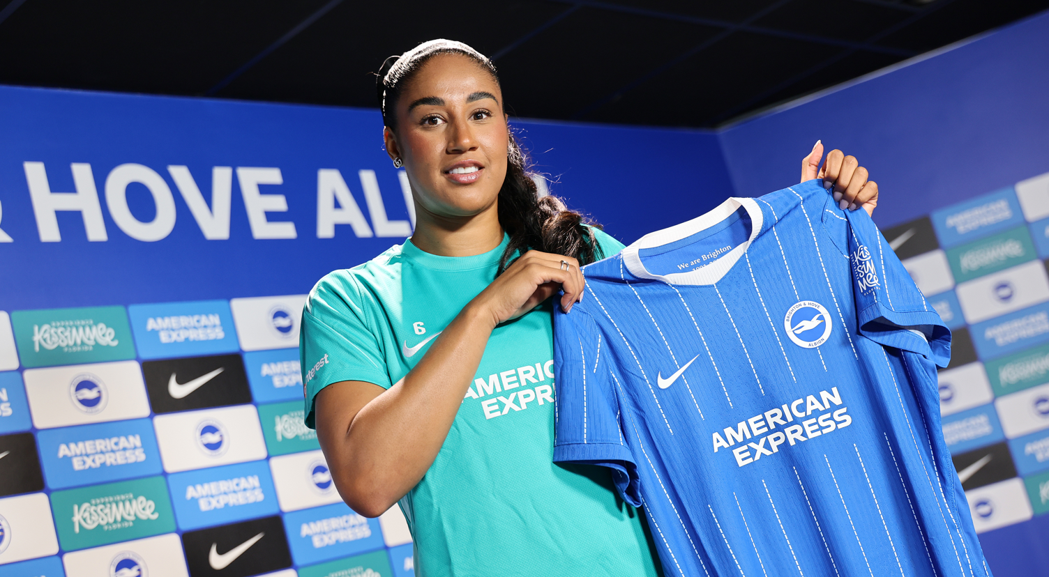 Gabby George with a Brighton shirt