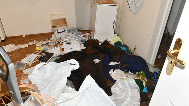 A filthy room, with rubbish strewn everywhere, at Legacy Independent Funeral Directors in Hull.