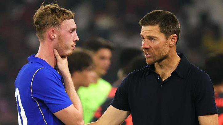 Xabi Alonso and Cole Palmer