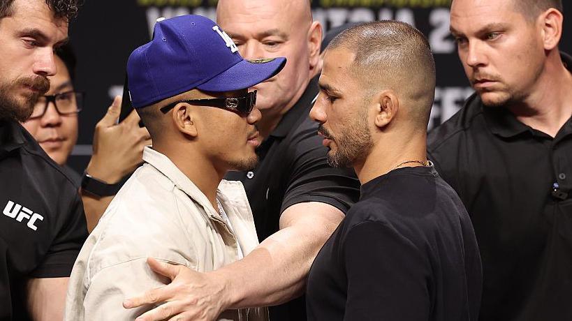 Joshua Van and Alexandre Pantoja face off at a UFC news conference