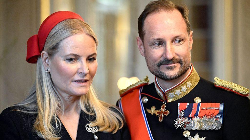 Mette-Marit and Haakon, dressed in military regalia, in March 2026