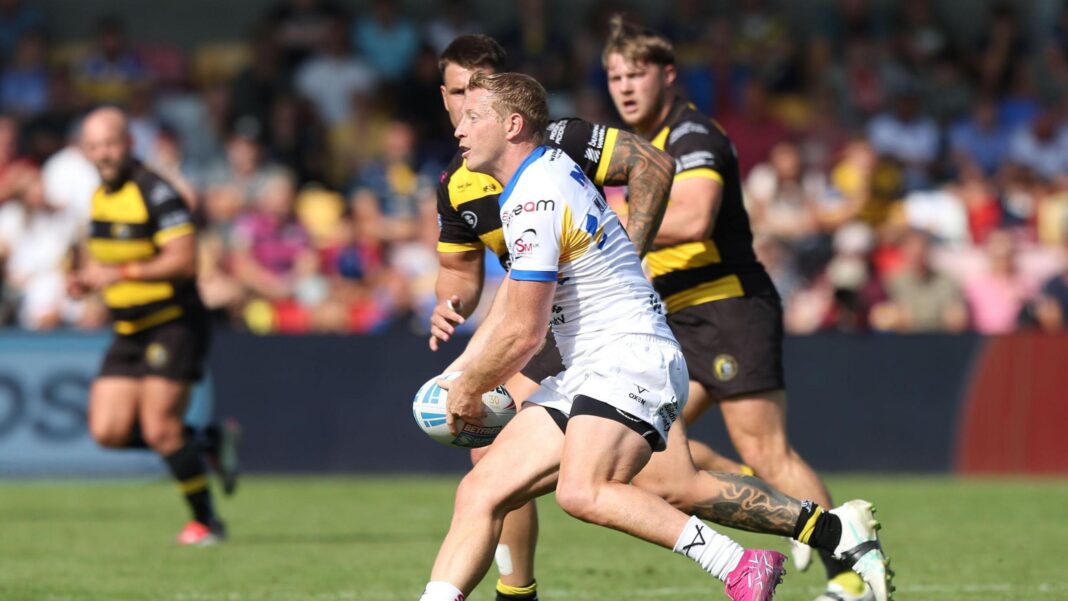 Twelve-try Leeds crush York to top Super League Twelve-try Leeds crush York to top Super League
