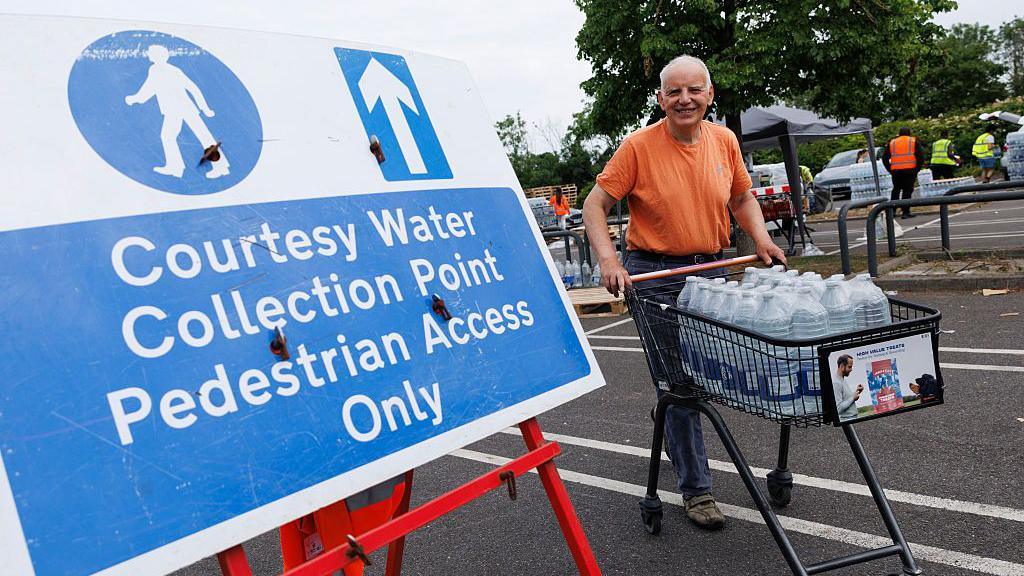 South East Water customers collect water from a collection point