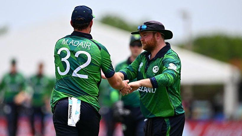 Mark Adair is congratulated by Paul Stirling