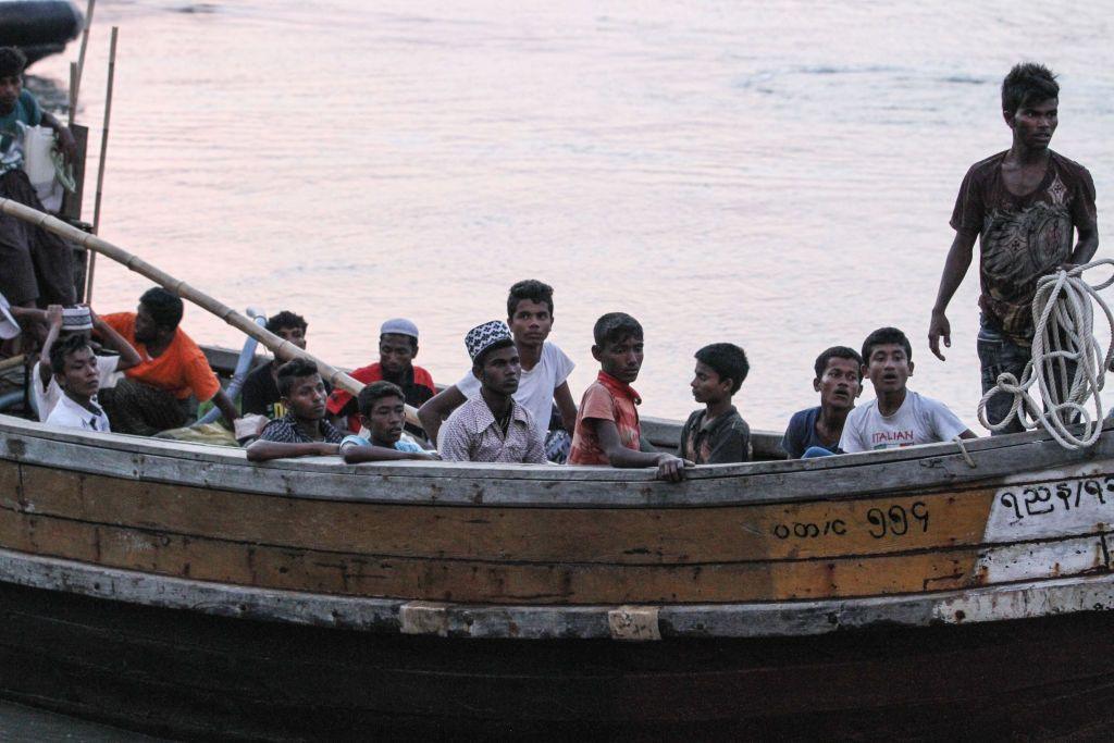 Rohingya refugees detained in Malaysia territorial waters off the island of Langkawi arrive at a jetty in Kuala Kedah, northern Malaysia on April 3, 2018. - The boat carrying dozens of Rohingya from Myanmar arrived in Malaysia on April 3 and the refugees will be allowed to enter the country, but an expert downplayed fears it might herald a new mass exodus. (Photo by - / AFP) / Malaysia OUT (Photo by -/AFP via Getty Images)