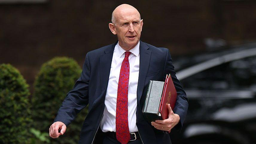 Chancellor of the Exchequer John Healey arrives at 10 Downing Street for Prime Minister Andy Burnham's first cabinet meeting
