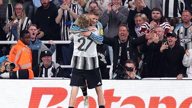 Harvey Barnes celebrates with Nick Woltemade