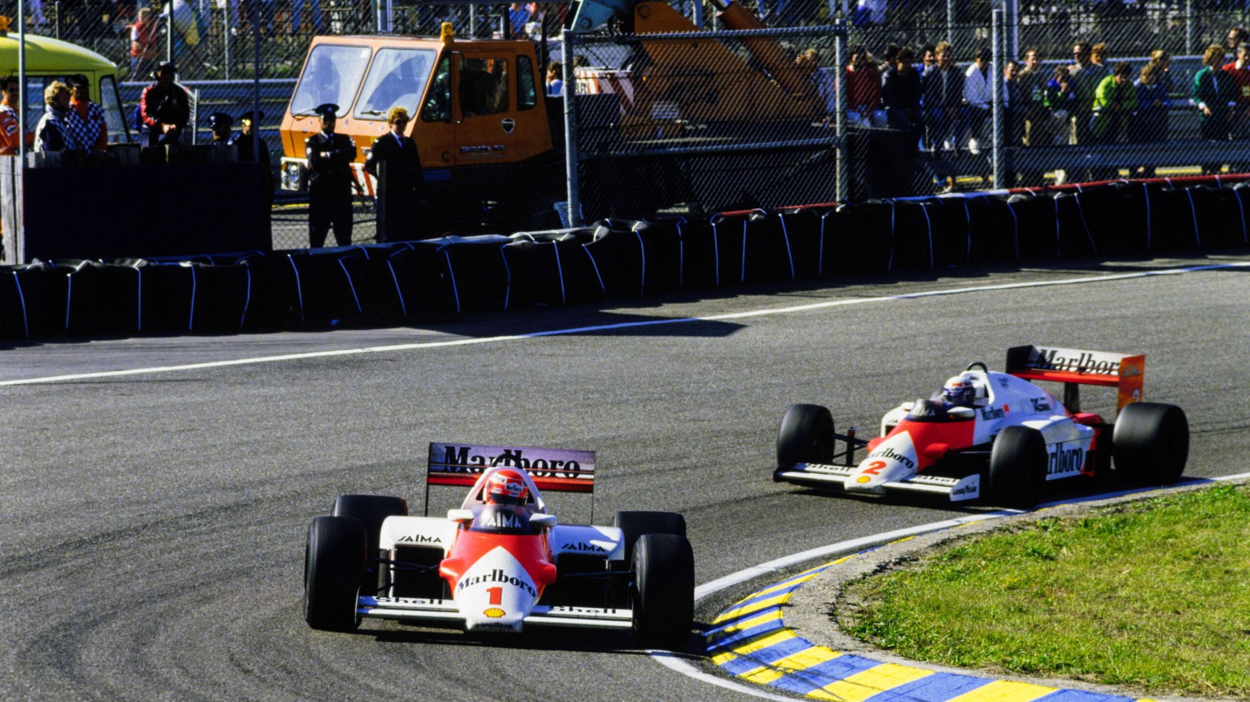 Niki Lauda ahead of McLaren team-mate Alain Prost during the 1985 Dutch Grand Prix