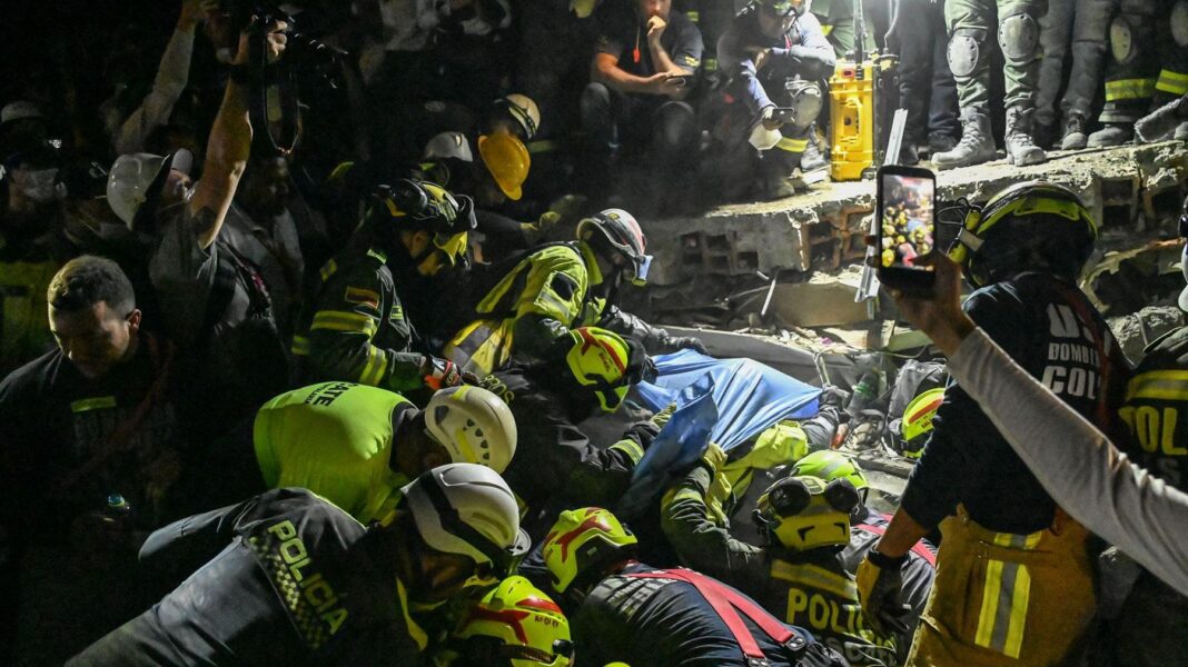 Woman pulled alive from rubble 36 hours after Colombia quake Woman pulled alive from rubble 36 hours after Colombia quake