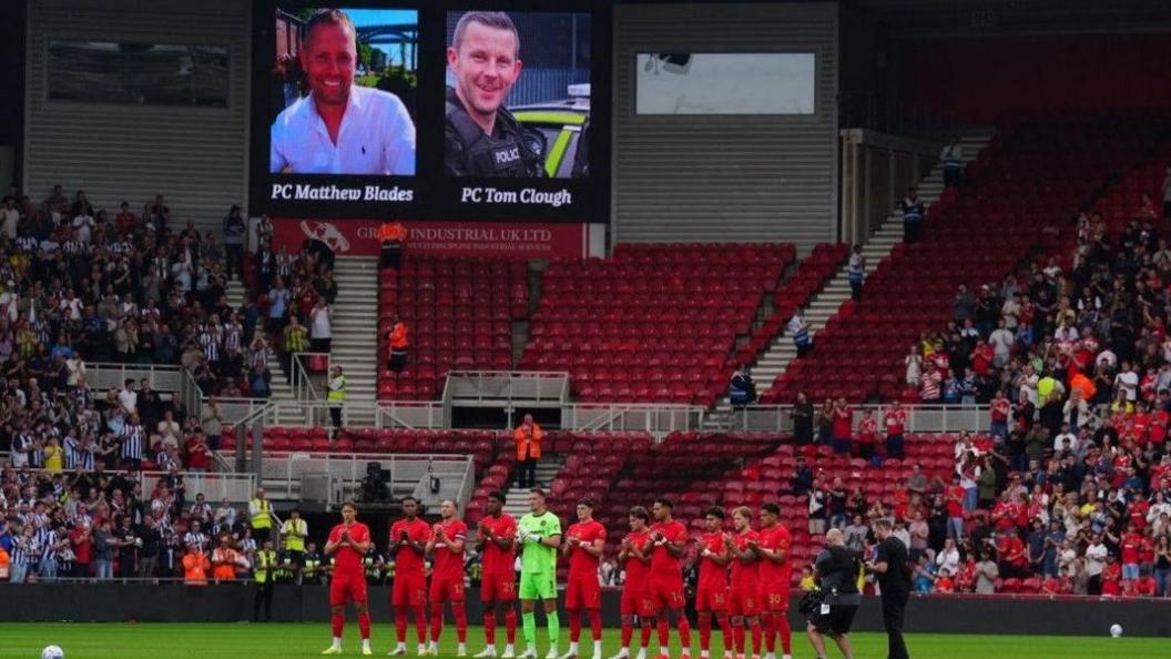 Football fans pay tribute to crash death officers at Middlesbrough match Football fans pay tribute to crash death officers at Middlesbrough match